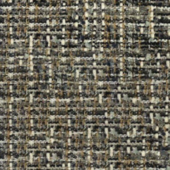 Woven tweed fabric sample with gray, beige, and gold yarns displaying a dense, irregular texture and matte finish; label reads “pacini & cappellini”.